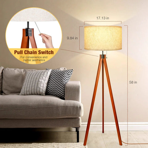 Wood Tripod Floor Lamp With Mid Century Vibe in living room, tall standing lamp with flaxen linen shade and pull chain switch