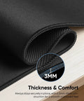 Close-up of Oversized Gaming Mouse Pad With Durable Stitched Edges And Non Slip Rubber Base For Home Office And Gaming Setups 31.5 Inches By 11.8 Inches Desk Mat Keyboard Mat highlighting 3mm thickness.