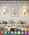 Top Shelf Battery Operated Wall Sconces Set Of Two With Remote Control Smart RGB Bulbs In Matte Gold in modern living room.