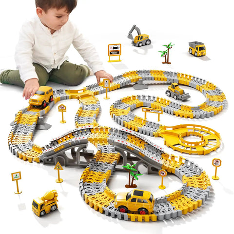 Child playing with Construction Race Track Toy Set For Toddlers And Boys 2 To 6 With 200 Flexible Tracks, cars, trucks, signs, and trees