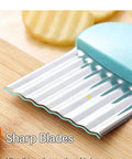 Four-piece stainless steel crinkle cutter set with blue handles for vegetables (front view).