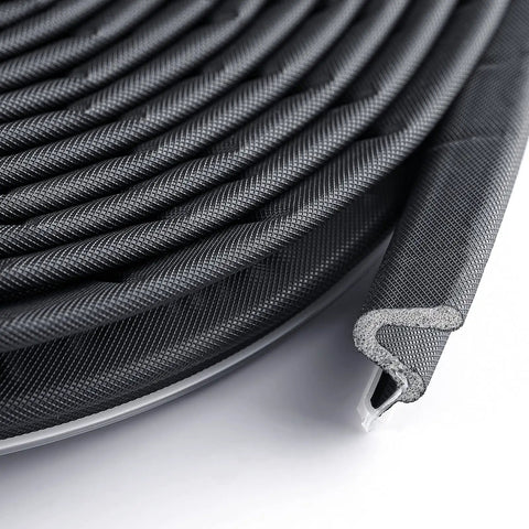 Close-up of 40ft black V-shaped foam kerf weather stripping door seal, for exterior windows and garage doors, soundproof draft stopper.