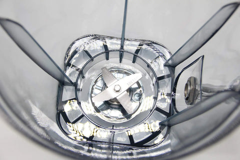 Heavy Duty Commercial Blender Packing Two Eight Zero Zero Watts And Six Liter Stainless Tank, showing stainless blades and container interior.