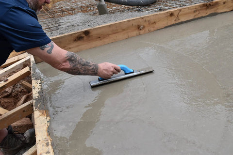 Pro-Grade Magnesium Concrete Float 3-1/8 x 16 In with beveled ends smoothing wet concrete on slab