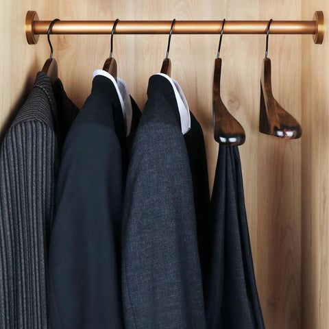Set Of 6 Premium Wood Hangers With Extra Wide Shoulders For Coats And Suits, displayed with suits hanging on them