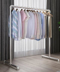 No Nonsense Straight Up Rock Solid Industrial Pipe Garment Rack Heavy Duty Free Standing Clothes Rail displaying assorted shirts.
