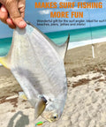 Person holding fish at beach, demonstrating Pompano Surf Fishing Rigs With Hand Tied Unique T Knot Saltwater Floats.