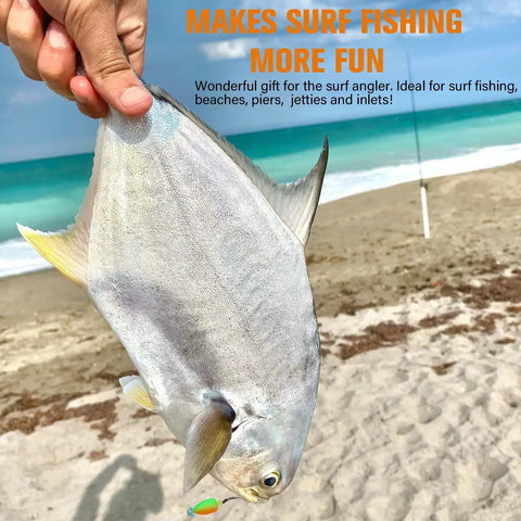 Person holding fish at beach, demonstrating Pompano Surf Fishing Rigs With Hand Tied Unique T Knot Saltwater Floats.