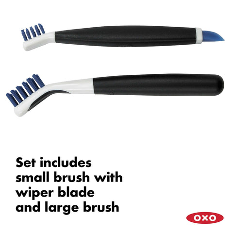 Blue Good Grips Deep Clean Brush Set with big grout brush and small brush with wiper blade, shown side by side.