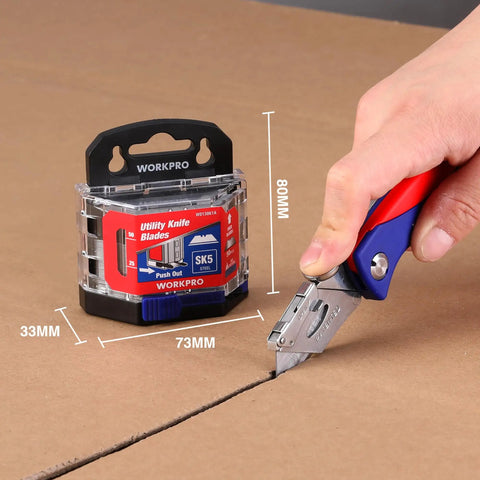 50 Pack Utility Knife Blades With Dispenser, Razor Sharp SK5 Steel Refills cutting cardboard, easy slide out case visible
