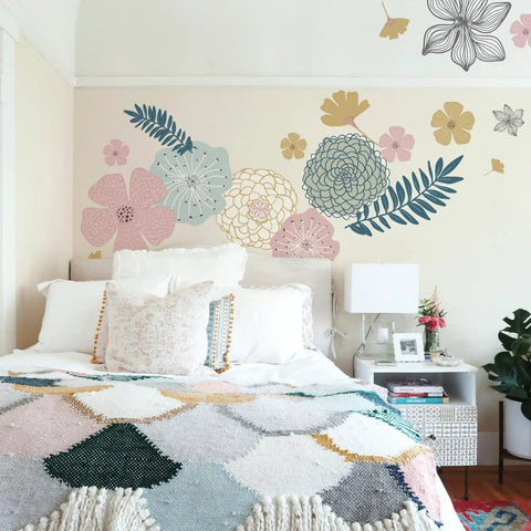 Bedroom with Pink Perennial Blooms Giant Peel And Stick Wall Decals Set Of 18 on wall above bed, featuring floral designs.