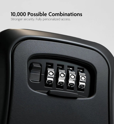 Close-up of Heavy-Duty Key Lock Box Wall Mount with 4-Digit Combination, black metal, showing number dials for security settings.