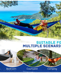 Image showing a blue Ultralight Parachute Nylon Camping Hammock with two tree straps in a scenic outdoor setting, supports up to 600 lbs.