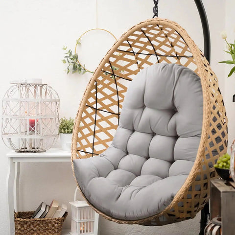 Gray thick egg chair cushion replacement for outdoor swing with button tufting plush PP cotton fill in wicker chair.