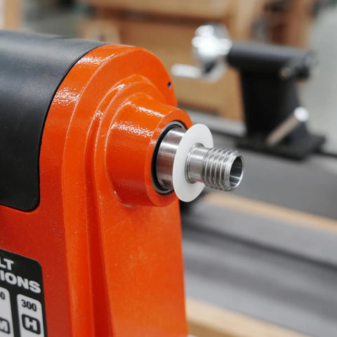Pack Of Six Slick Anti Lock Spindle Washers Tailored For 1-1/4 Inch Woodlathe Threads installed on a wood lathe.