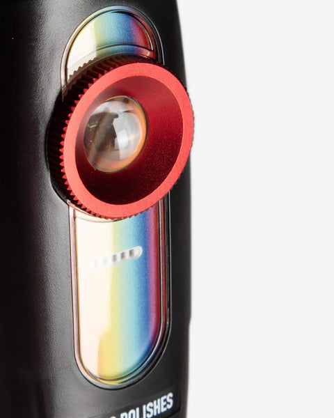 Close-up of handheld dual LED UV flashlight with rainbow detail and red adjustment ring; IP65 waterproof, long battery life, 4-hour charge