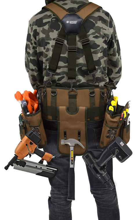 Man wearing a Rugged Pro Tool Belt With Tan And Green Comfort Rig Heavy Duty Construction Iron Buckles Reinforced Stitching Adjustable Suspender Straps Custom Fit For All Day Comfort On Tough Jobs, holding various tools.