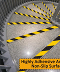 Six Rolls Black And Yellow Caution Tape 2In By 108Ft Floor Marking Tape For Clear Pathways And Safety Zones Pro Grade High Visibility Adhesive Warning Tape For Warehouse Walls Steps Pipes And Equipment installed on stairs