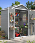 6x4 Ft Resin Outdoor Storage Shed With Floor And Window, Lockable Door open, showcasing bikes, tools, and lawn gear inside