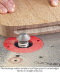Top Notch Carbide Tipped V Groove Finger Grip Router Bit One Half Inch Shank For Thick Cutting Boards And Serving Trays in action cutting wood.