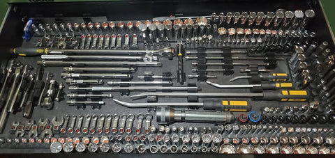 One Quarter Inch Socket Organizer Kit With Twelve Modular Sockets And Six Spacers For Quick Grab And Go Organization Of Your Socket Set Perfect For Gearheads And DIY Pros Durable Expandable And Easy To Access, showing organized socket set with tools in a drawer.
