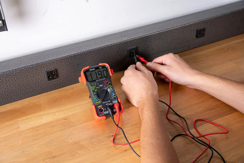 Auto-Ranging Digital Multimeter For Automotive And Home Electrical Troubleshooting UL Certified in use with wall outlet.