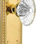 Meadows Plate With Oval Fluted Crystal Glass Privacy Knob Set Two And Three Eighths Inch Backset Polished Brass Door Hardware