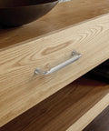 5-inch brushed satin nickel cabinet handle on wooden drawer, part of 10 Pack 5 Inch Brushed Satin Nickel Cabinet Handles For Kitchen Cabinets And Cupboards Durable Cabinet Pulls Hardware For Drawers And Doors Premium Brushed Finish Easy To Install Suitable For Modern And Traditional Decor.