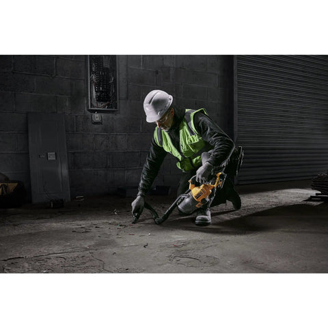 Worker using Beast 20V Cordless Handheld Vacuum With HEPA Filter LED Light for dry debris on workshop floor