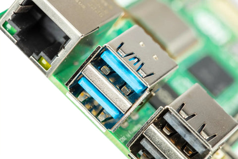 Close-up of USB 3.0 and Gigabit Ethernet ports on Beefed-Up 8GB RAM Single Board Computer for Makers and Media Buffs.