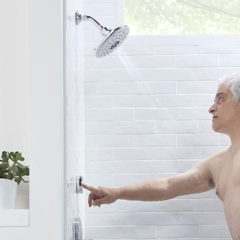 Person using Spectra Plus ETouch 4 Function Shower Head With Wall Remote, Easy Touch Pattern Switch, 2.5 GPM, Polished Chrome.