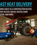 Heavy Duty 155000 BTU Portable Infrared Radiant Heater With Dual Heating Setup For Blazing Job Site Warmth That Kicks Serious Heat Through The Chillest Worksites beside construction machinery in barn.