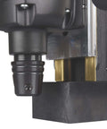Makita HB350 1-3/8-inch magnetic drill, side view showing the chuck, black housing, and brass guide blocks.