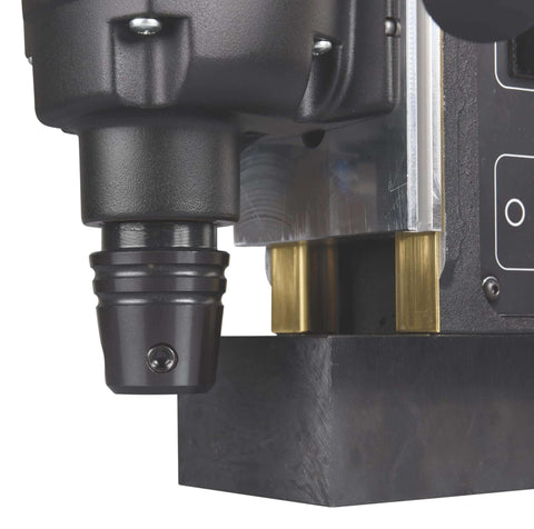 Makita HB350 1-3/8-inch magnetic drill, side view showing the chuck, black housing, and brass guide blocks.