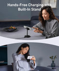 Woman using MagSafe Charger Stand For iPhone 17 16 15 14 13 Series 15W Fast Wireless Charging Station Qi2 Certified 360 Degree Adjustable Stand For Hands Free Viewing Sleek Magnetic Wireless Charger Dock at a desk.