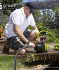 Person using pump connected to the 1 Inch ID PVC Suction Hose With Foot Valve Non Return Assembly 13 Foot Length All In One Pump Inlet Kit