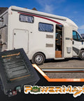 Bad Boy 55 Amp Deck Mount Rv Converter Charger displayed near a camper van by a lake, ideal for power conversion needs.