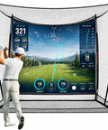 Golfer using 10x8 Ft Golf Practice Net with Side Barriers and Dual Layer HD Simulator Screen, outdoor setup