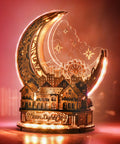 Moon City 3D DIY Puzzle With LED Light, wooden night city model in warm brown finish lit on shelf