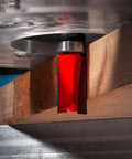 Top Bearing Flush Trim Router Bit, Three Quarters Inch Diameter, Two-Cutter Carbide, One Half Inch Shank in router setup.