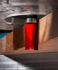 Top Bearing Flush Trim Router Bit 3/4 X 1-3/4 Inch With 1/2 Inch Shank in use for wood cutting on table-mounted router.