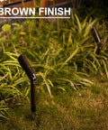 Brown finish spotlight from 8 Pack Low Voltage Landscape Lighting Kit That Lights Up Your Yard, set in garden greenery