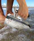 Hand using Sand Scoop For Metal Detecting And Treasure Hunting Stainless Steel Shovel With Adjustable Length Underwater Beach Dig Gear