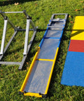 Parts of Beefy Durable Aluminum And Steel Dog Teeter Board With Rubber Skin Adjustable 21 To 27 Inches 12 Inch Wide on grass