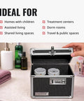 Person opening Locking Medicine Box With Combination Lock For Safe Medication Storage Portable Metal Lock Box For Pills And Valuables Small Code Protected Storage Case Black on bathroom counter.