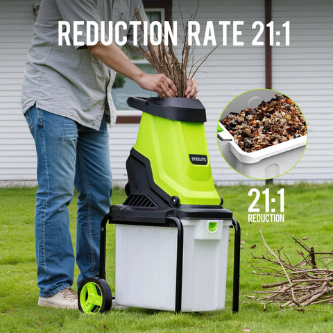 Person using Electric Wood Chipper Shredder With 55L Collection Bin, 15 Amp Motor Up To 4000 RPM, Dual SK5 Steel Blades