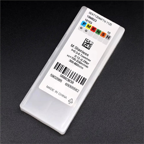 Pro Grade Carbide Inserts For CNC Metal Turning Tools in labeled packaging with barcodes and specifications