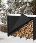 Tough As Nails Heavy Duty Outdoor Firewood Storage Rack with Weather Resistant 600D Cover in snowy landscape, logs visible