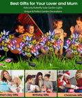 Family enjoying Solar Garden Lights Outdoor 2 Pack with 34 Butterflies and 44 LED Fairy Lights in a garden.