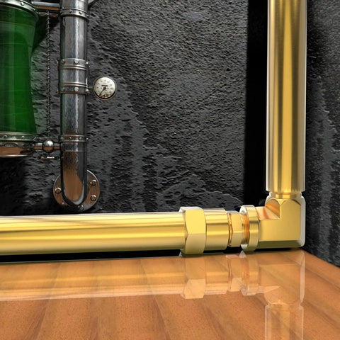 2 Pack 90 Degree Street Elbow Brass Pipe Fitting Half Inch NPT Male To Half Inch NPT Female Barstock Corrosion Resistant Plumbing Connector For Pipes And Fluid Lines installed against a black textured wall with adjacent piping visible.